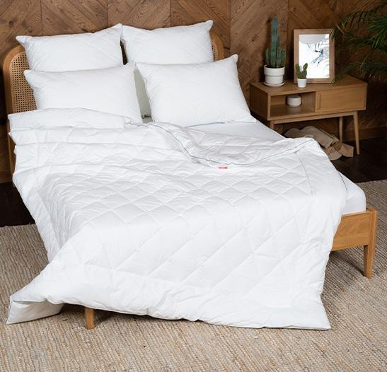 Подушка из хлопка и полиэфира в тике стеганая Легкие Сны МИРЭЛЬ 68х68 регулируемая